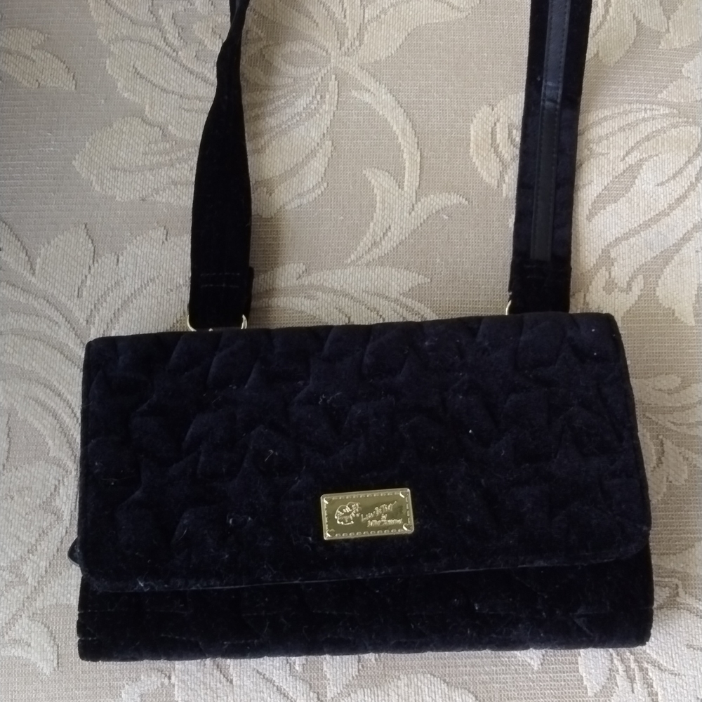 Betsey Johnson wallet with a shoulder strap